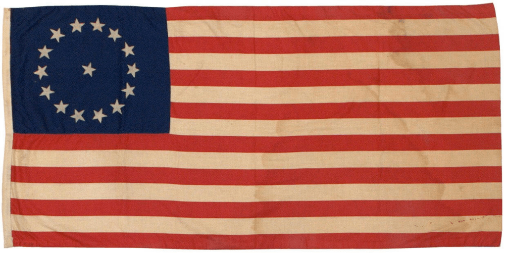 Betsy Ross flag featuring 13 stripes and a circle of 13 stars on a blue field, symbolizing the original American colonies.